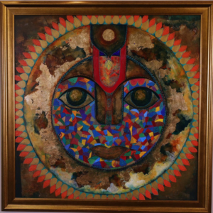 surya "Surya" by Anju Kumar, a mixed-media painting of a vibrant, stylized sun deity face filled with colorful mosaic patterns, framed by red petal rays and a gold burnished background.